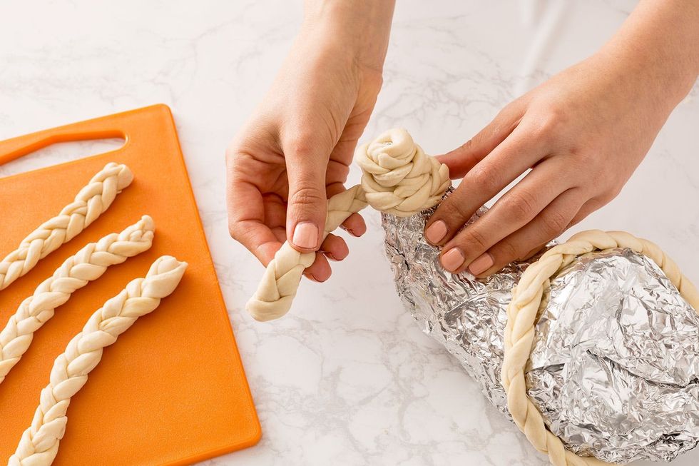 braided croissant dough around cornucopia shape