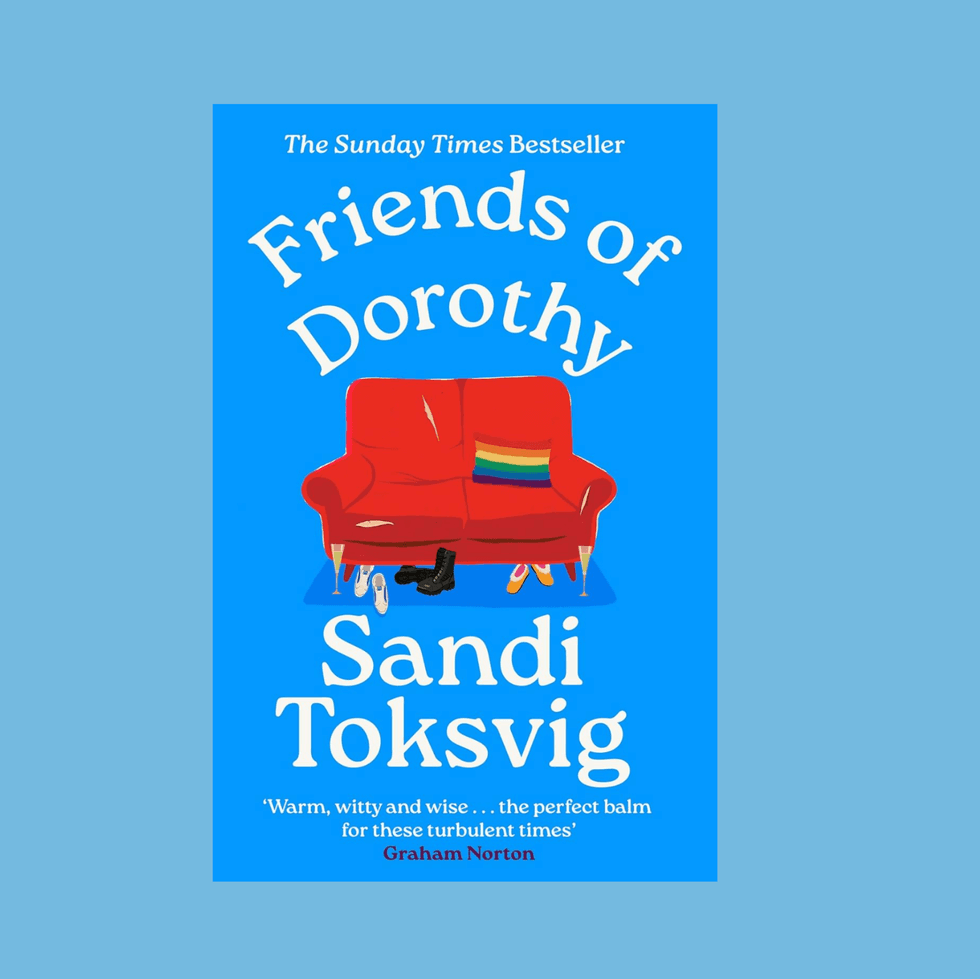 Bright book cover: "Friends of Dorothy" by Sandi Toksvig with red sofa and rainbow pillow.