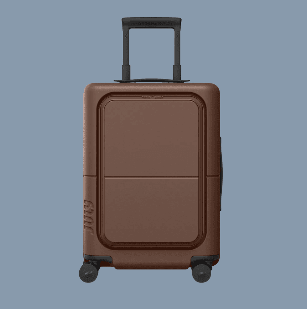 Brown hard-shell suitcase with a retractable handle and four wheels.