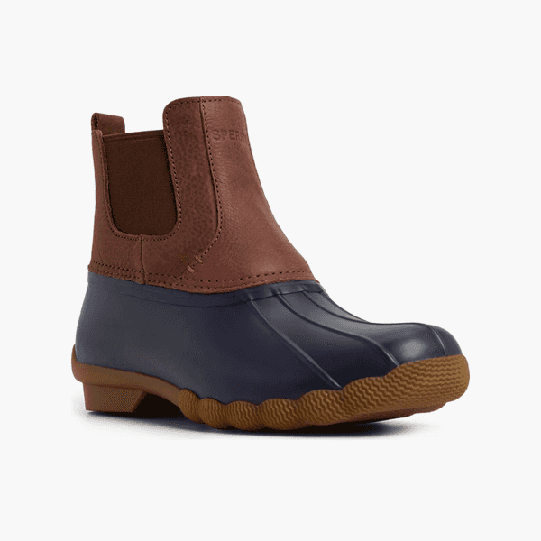 Brown leather and navy rubber waterproof duck boot with a tan lug sole.