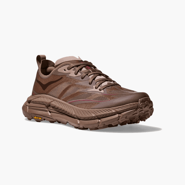 Brown trail-running shoe with rugged lugged sole and dark laces, shown on a white background.