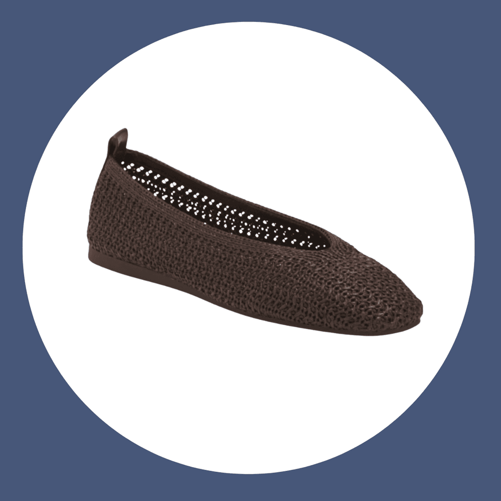 Brown woven ballet flat shoe on a circular white background.
