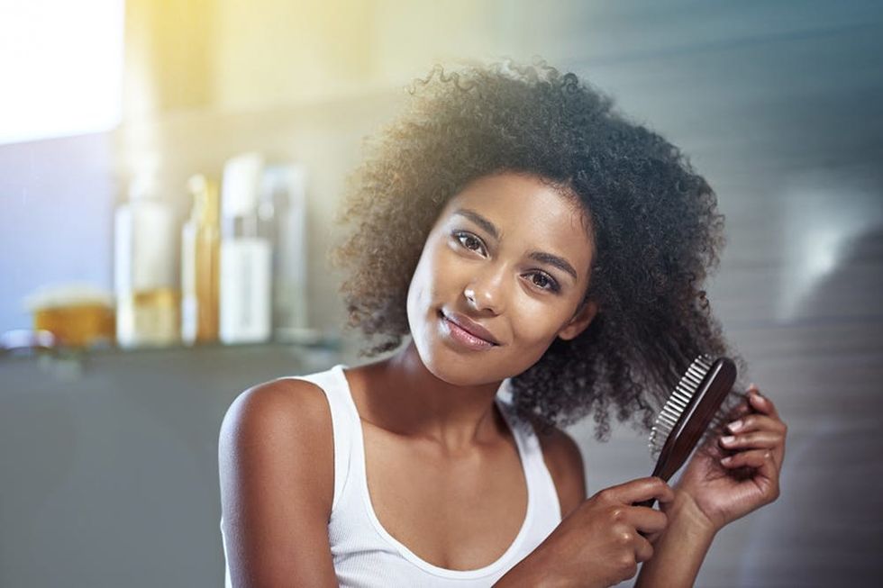 Brushing-my-hair-but-leaving-the-curls-000072615679_Medium