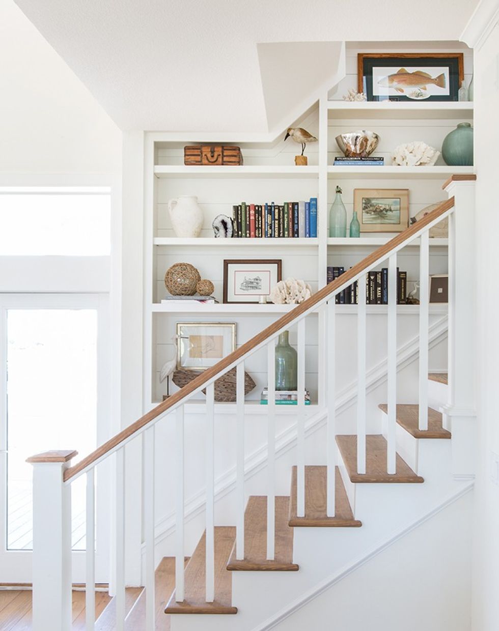 built-in shelves for staircase wall decor