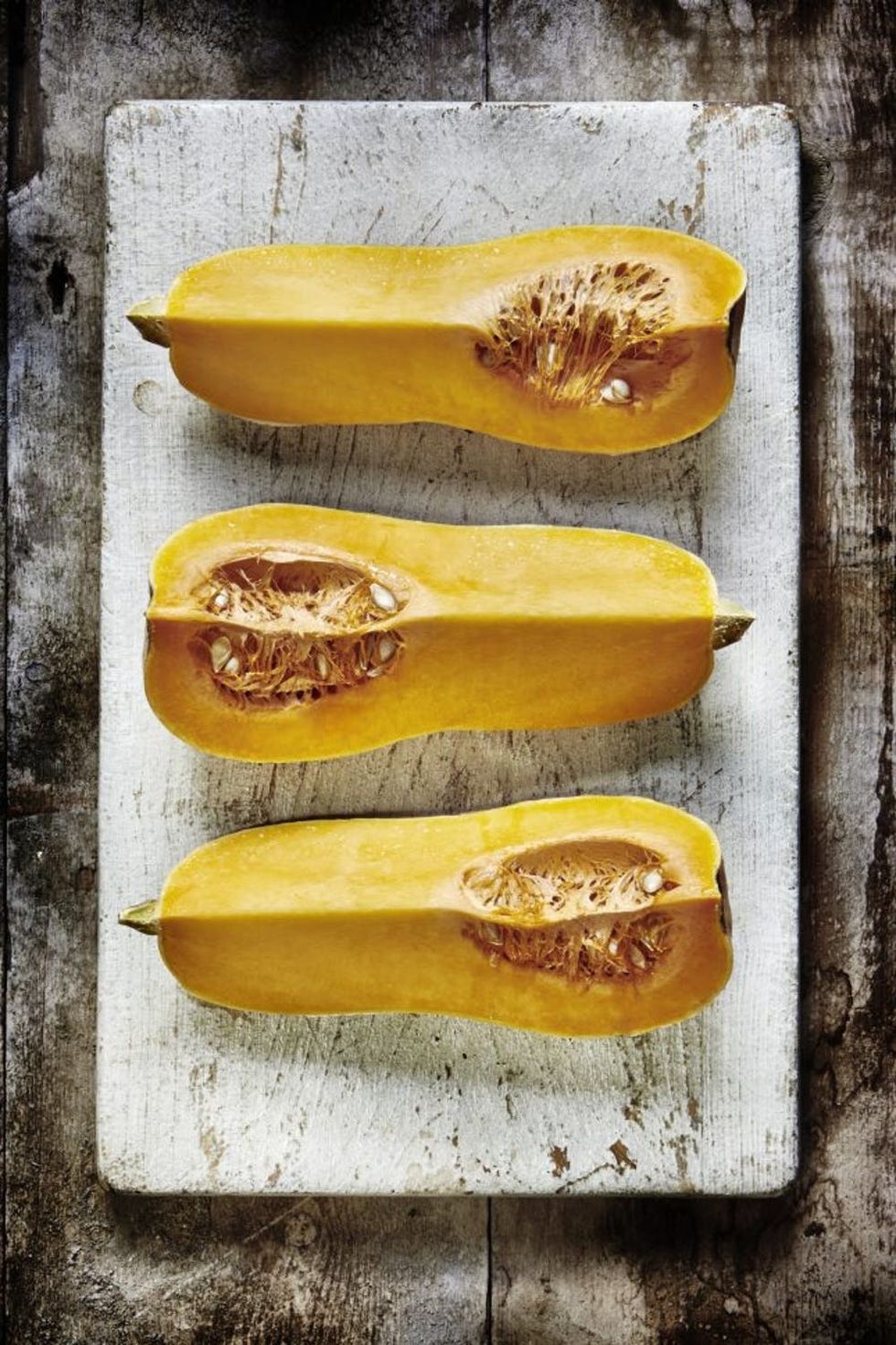Butternut squash on a wooden board