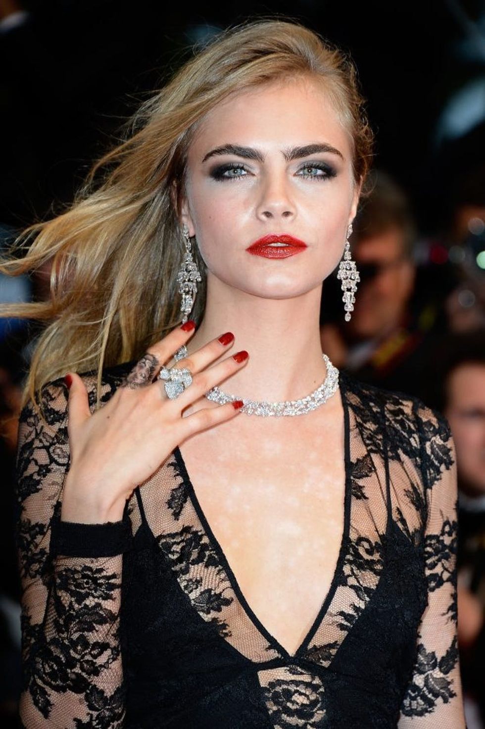 Cara Delevingne _ lion finger tattoo