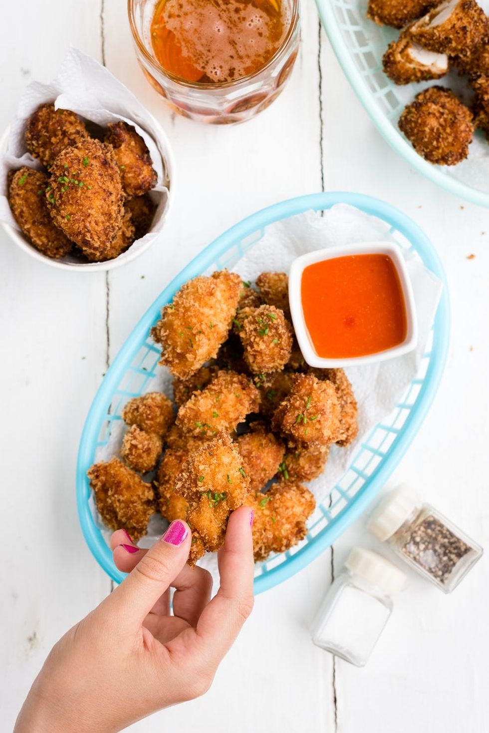 Celebrate National Fried Chicken day with super-addictive popcorn chicken with hot chilli sauce. Finger lickin' good!