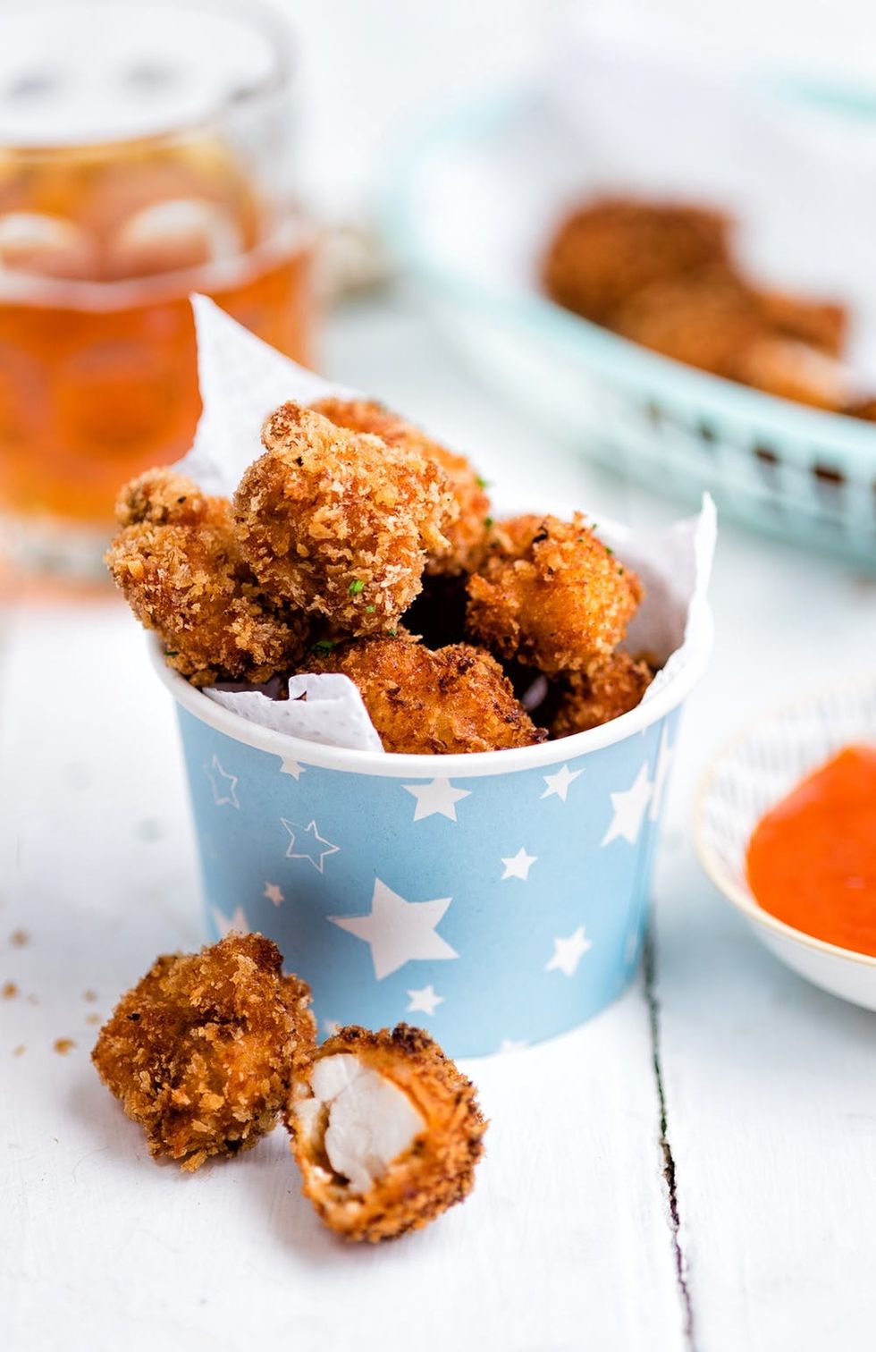 Celebrate National Fried Chicken day with super-addictive popcorn chicken with hot chilli sauce. Finger lickin' good!