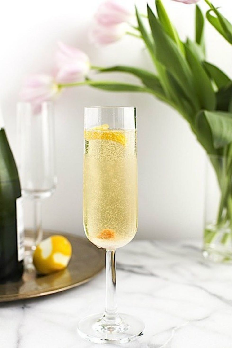 Champagne, Bitters + Lemon Zest Cocktail