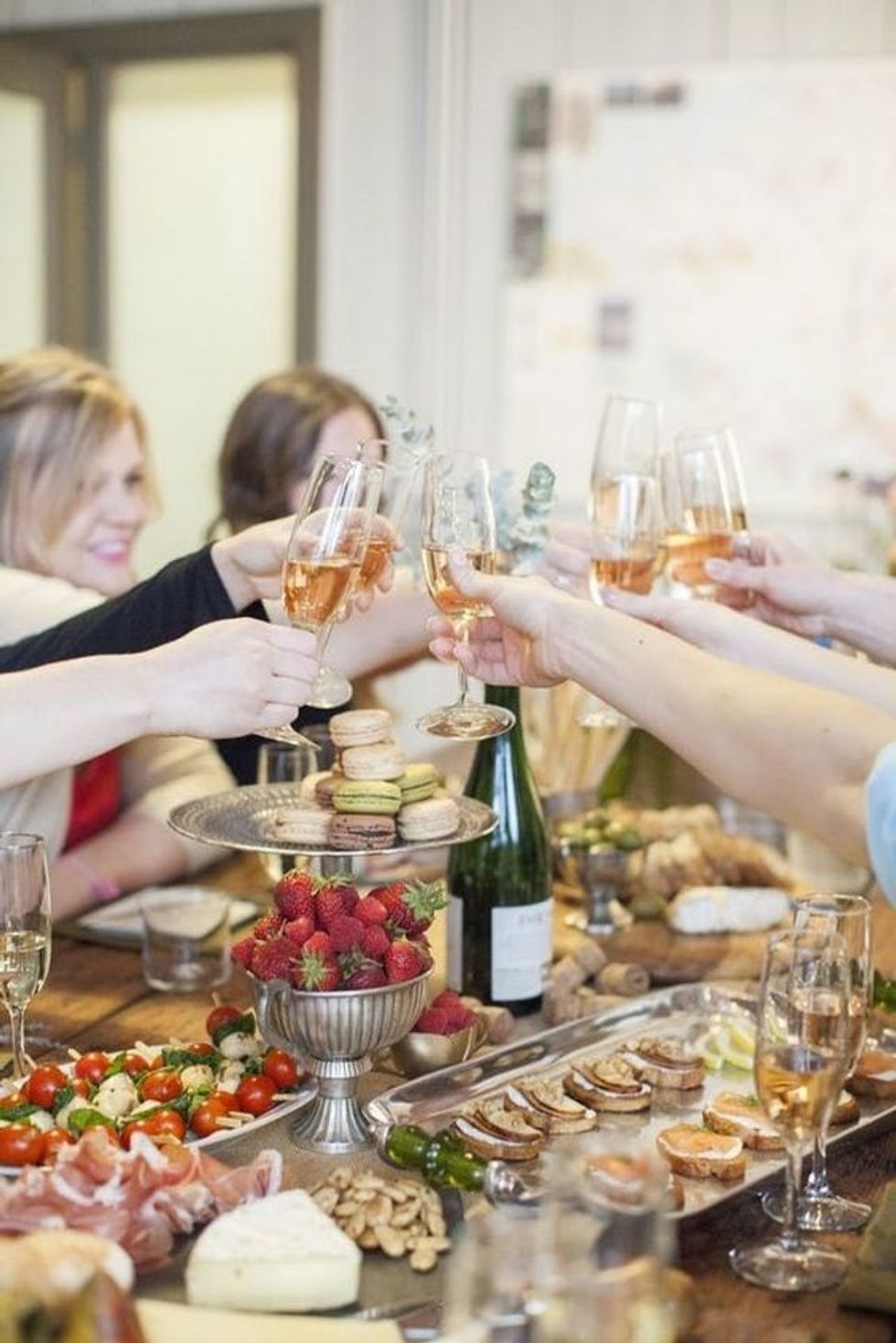 Champagne Tasting with your bridal party with charcuterie boards and glasses of champagne