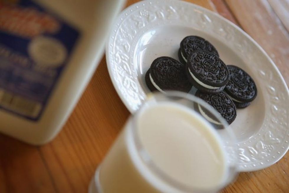 CHICAGO, IL - DECEMBER 27: In this photo illustration, milk and cookies sit on a counter on December 27, 2012 in Chicago, Illinois. Milk prices could spike to $6 to $8 a gallon in January if lawmakers fail to reach a "fiscal cliff" deal and renew a Farm Bill that's been in place since 2008 and sets the price at which the government buys milk. (Photo Illustration by Scott Olson/Getty Images)