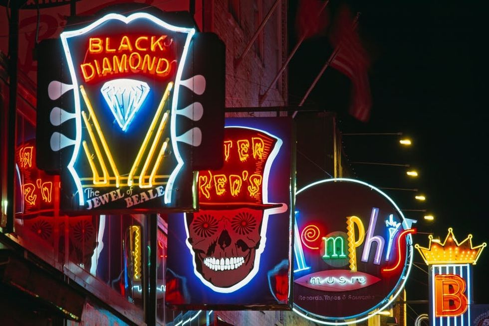 Colorful neon signs line Memphis's famous Beale Street