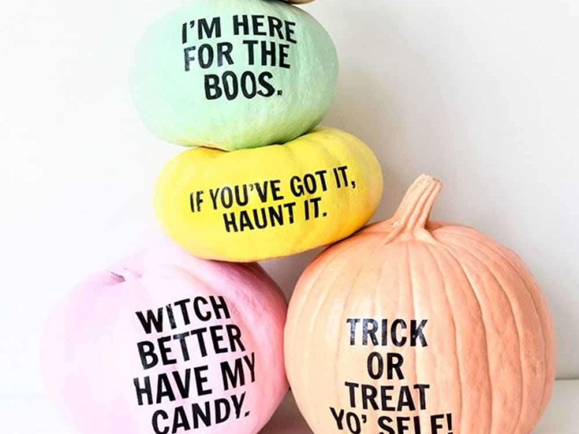 Colorful pumpkins with Halloween phrases: "I'm Here for the Boos," "Witch Better Have My Candy."