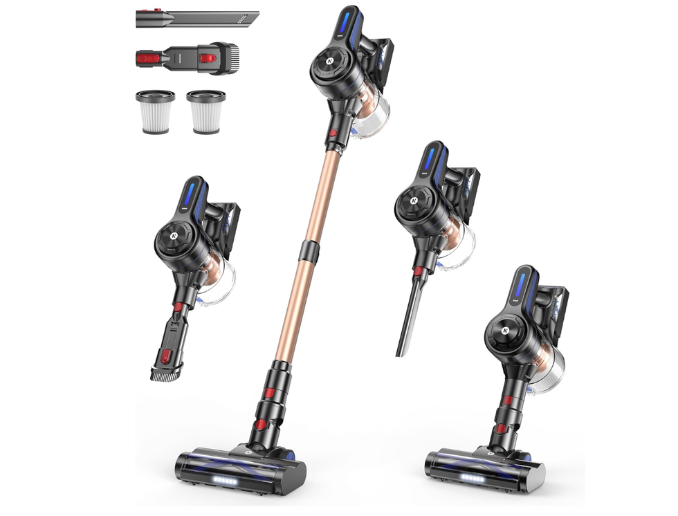 Cordless vacuum with copper tube, multiple attachments, and two filter replacements.