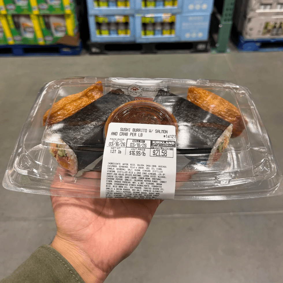 Costco's new Kirkland Signature Sushi Burrito with inari and dipping sauce in a plastic package.