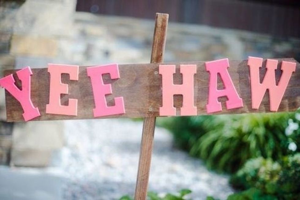 Country Western bridal shower idea with sign with pink and coral letters