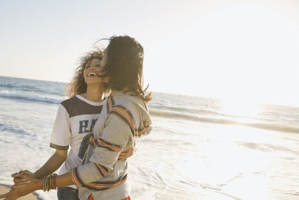 Couple dancing on beach