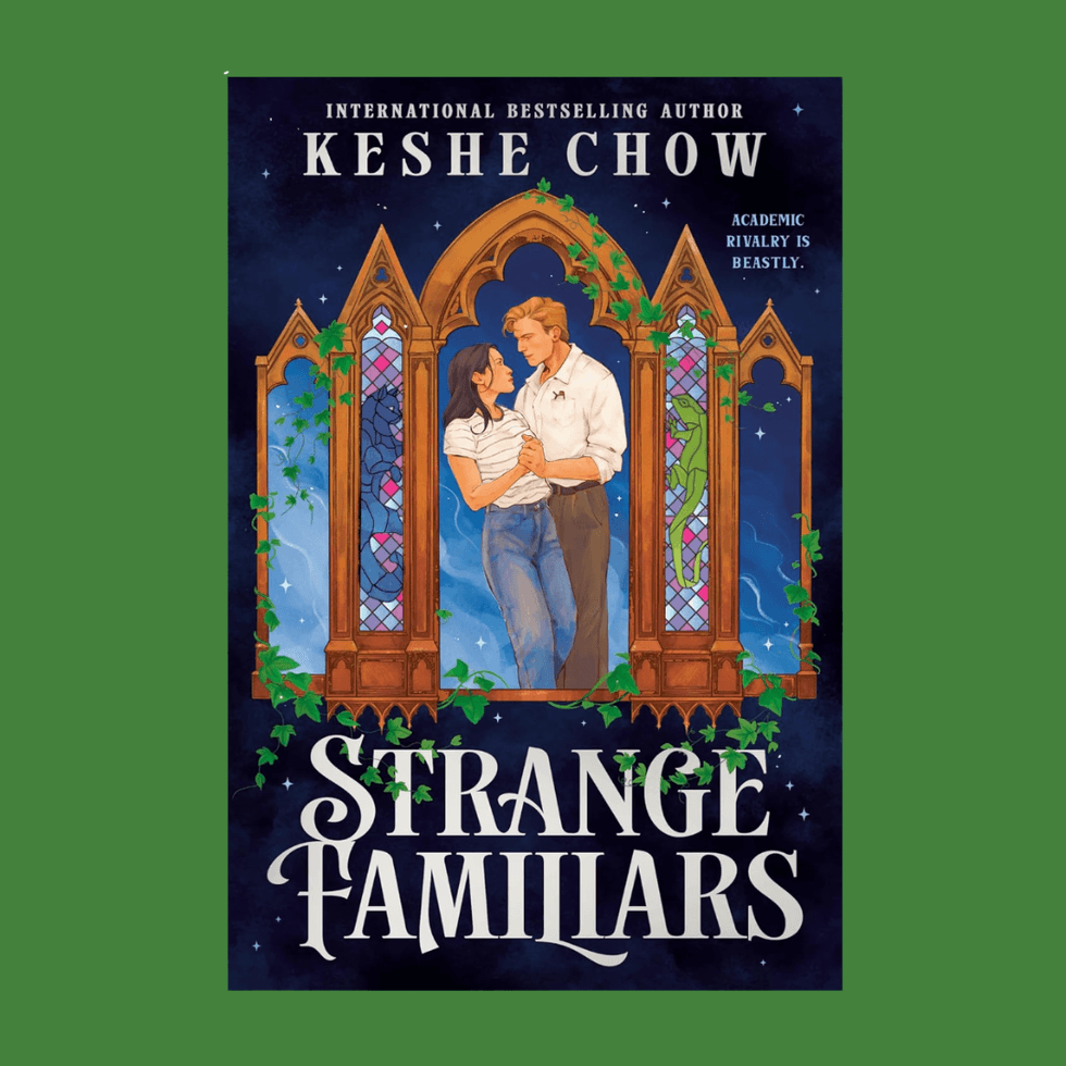 Couple embracing in front of Gothic windows on the "Strange Familiars" book cover.