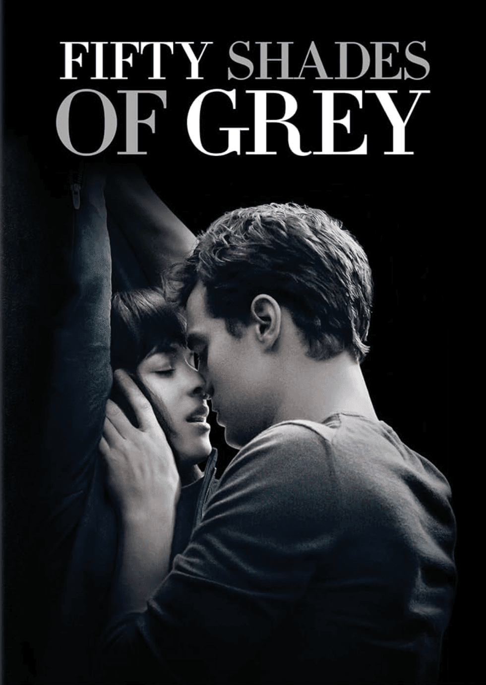 Couple embracing intimately beneath the "Fifty Shades of Grey" title.