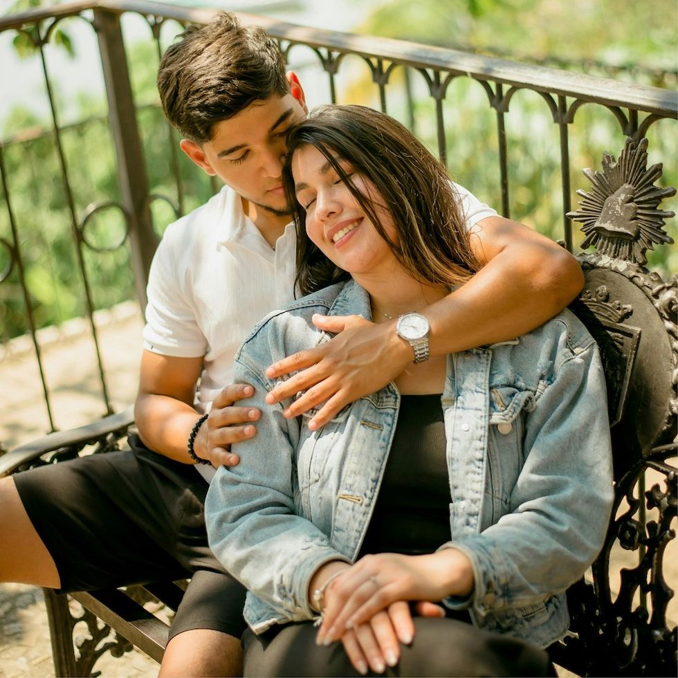 couple sitting on a bench together