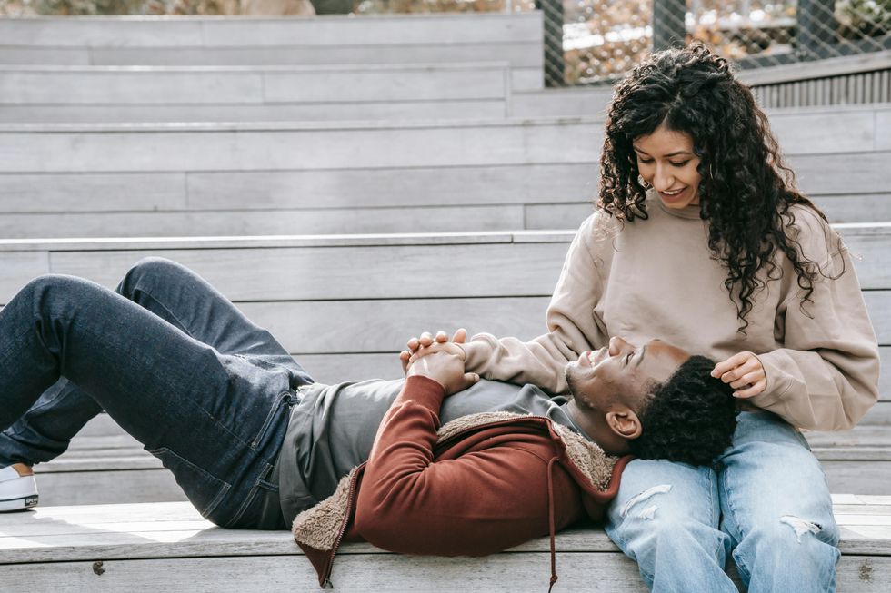 couple talking on stairs