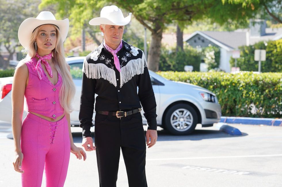 cowgirl barbie in pink and cowboy ken in black and white