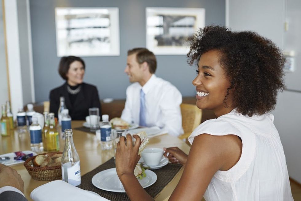 Coworkers meet over lunch