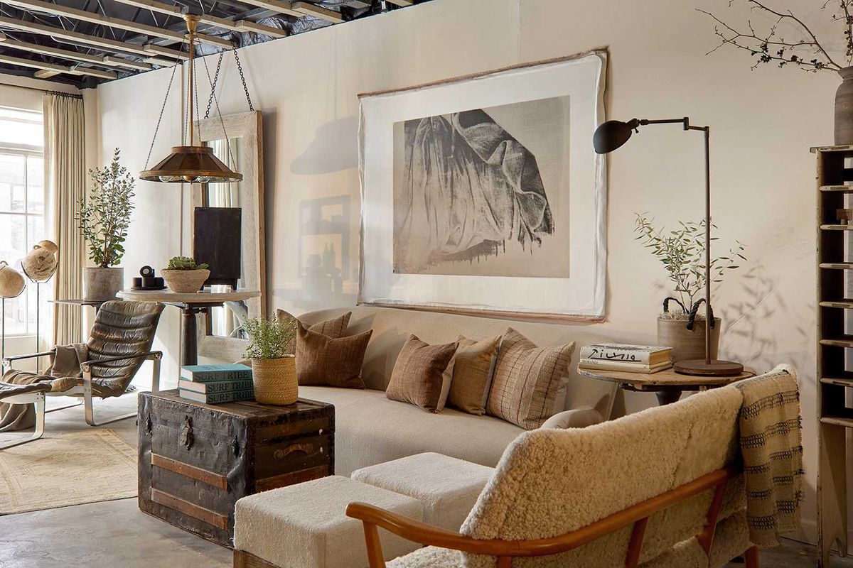 Cozy living room with neutral tones, vintage decor, and rustic accents.
