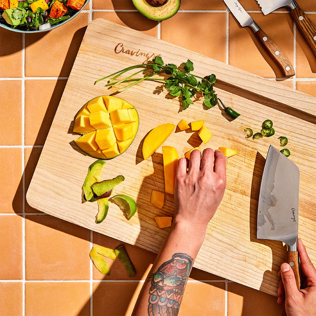 Cravings by Chrissy Teigen Chop-Everything Wooden Cutting Board ($32)