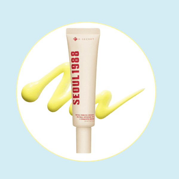 Cream tube labeled "Seoul 1988" with yellow cream swirl on pastel background.