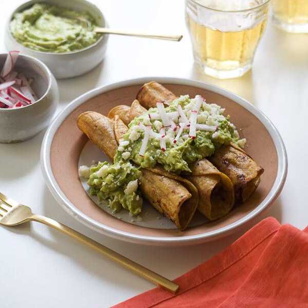 Crispy Chicken Taquitos with Avocado Crema