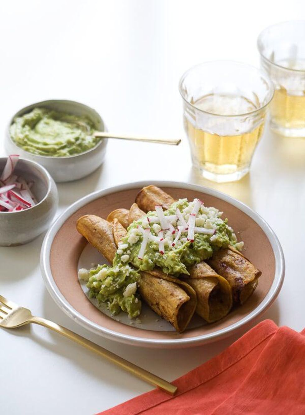 Crispy Chicken Taquitos with Avocado Crema