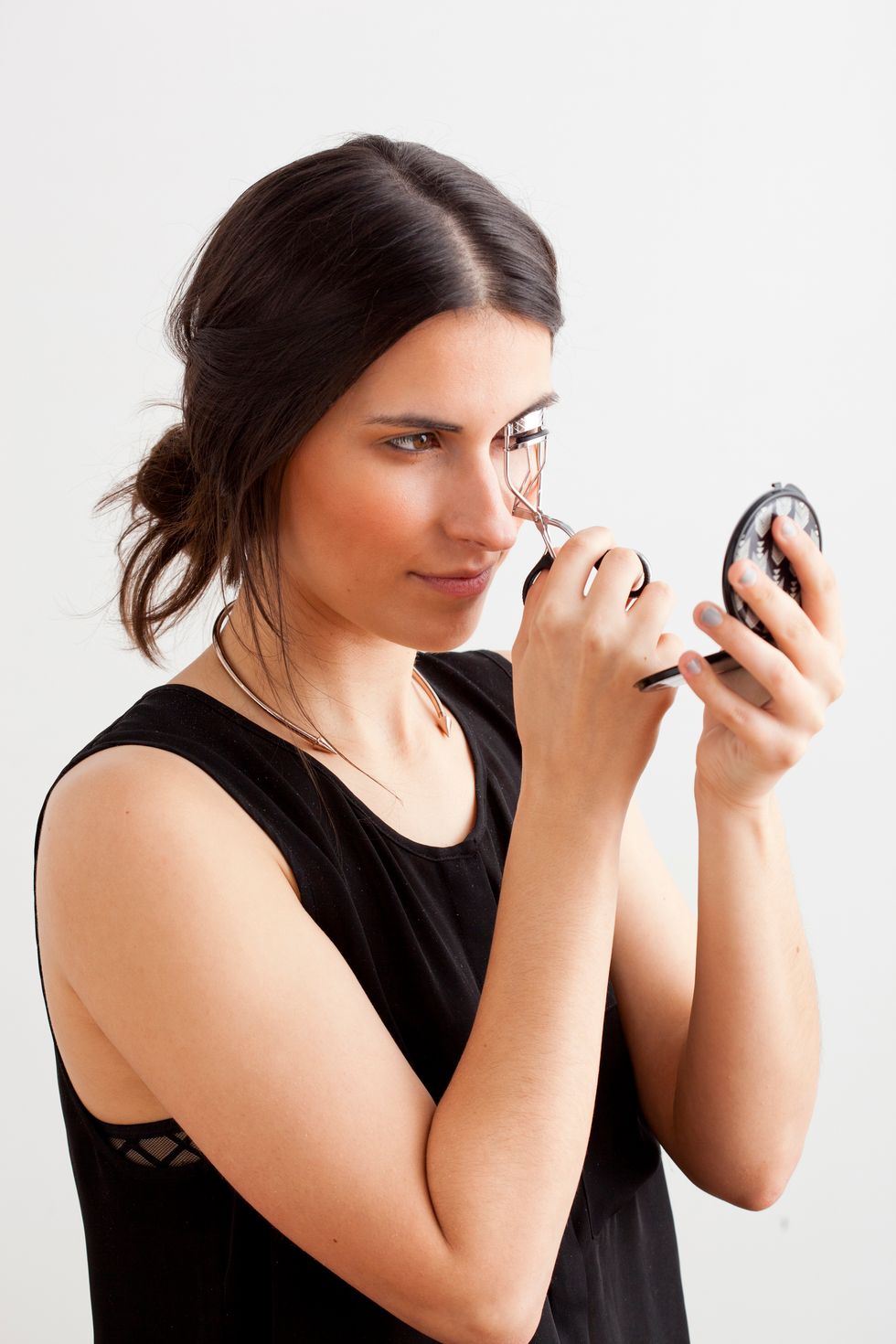 curling your eyelashes look awake