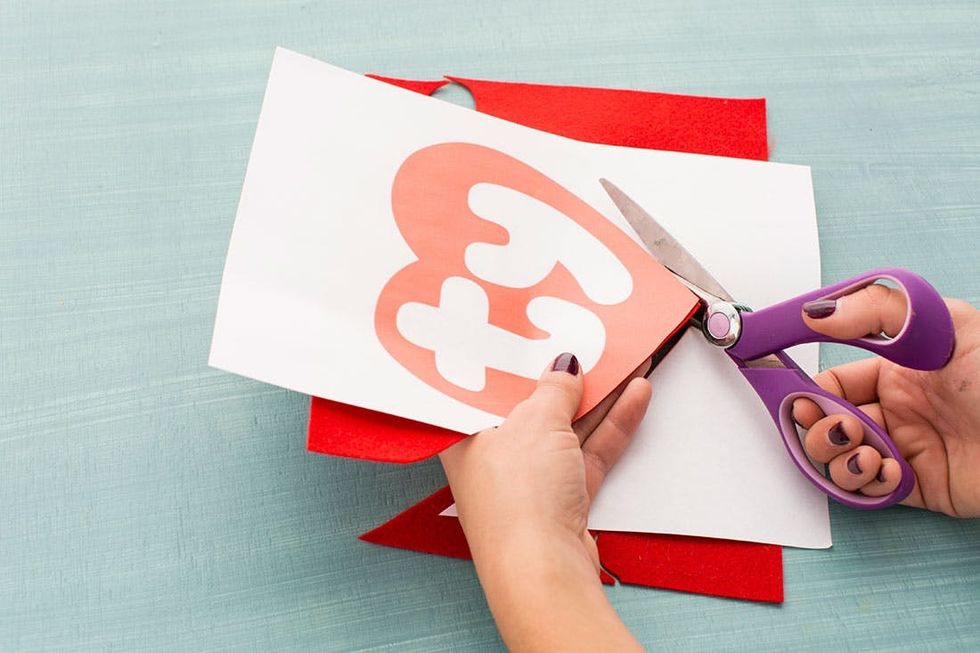 cut out the red heart on the felt