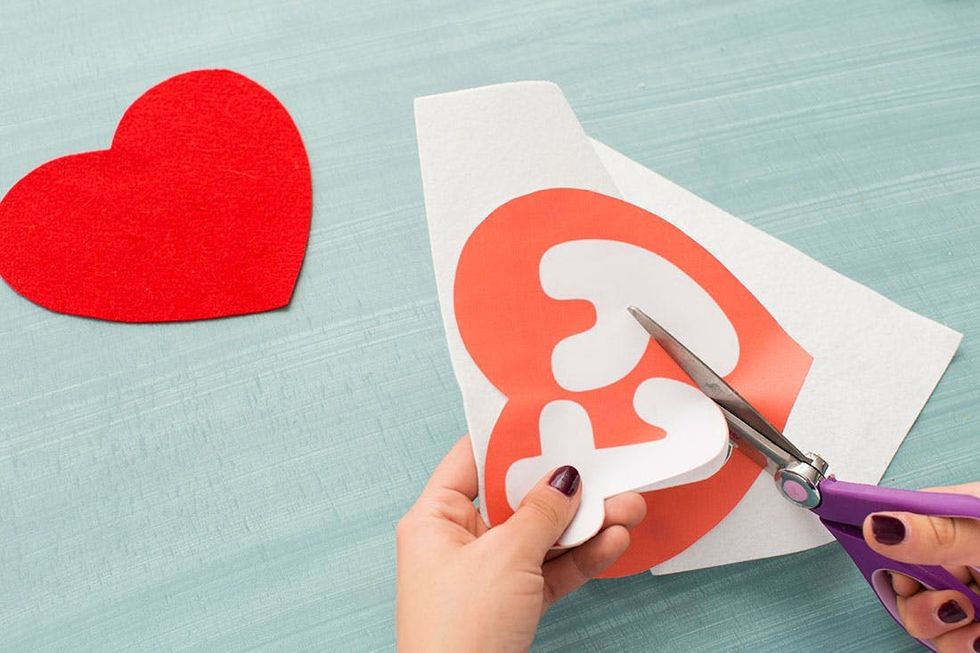 cut out the white letter with felt beanie baby costume