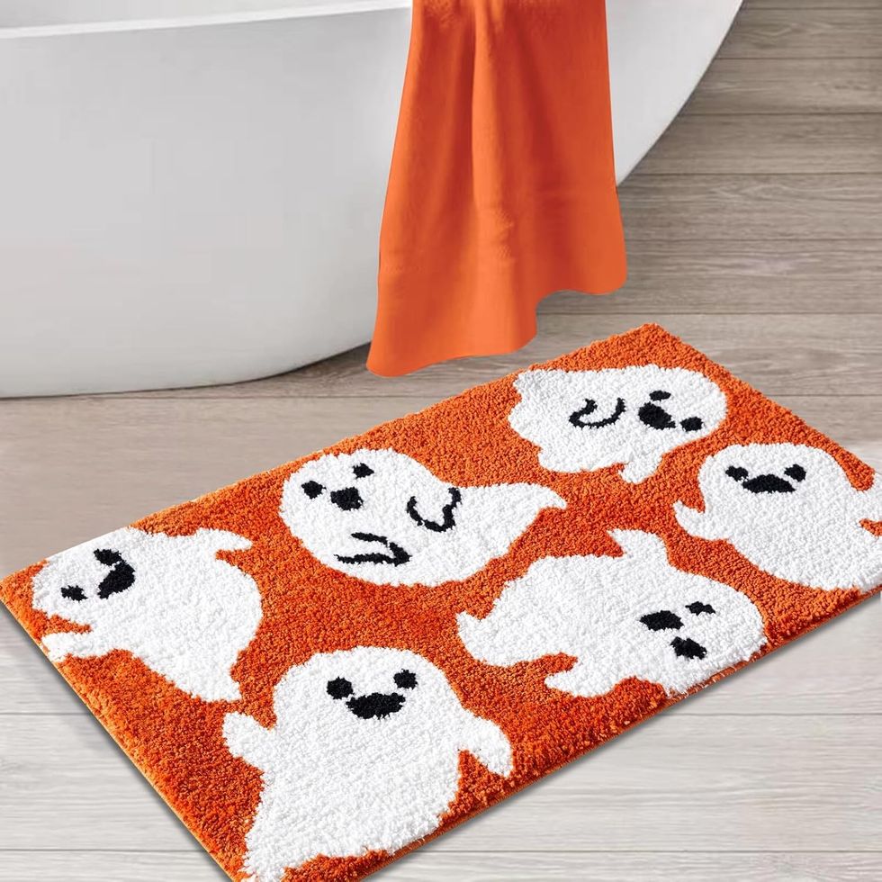 cute orange ghost bathmat