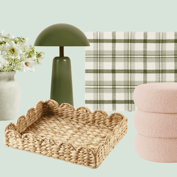 Decor items: vase with flowers, green lamp, plaid mat, woven tray, pink pouf.