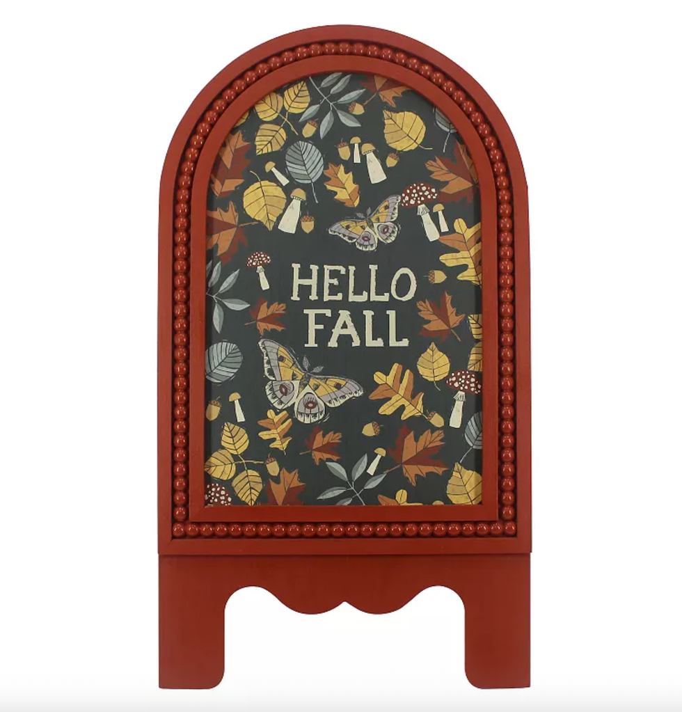Decorative sign with "Hello Fall" text, autumn leaves, mushrooms, and two moths.