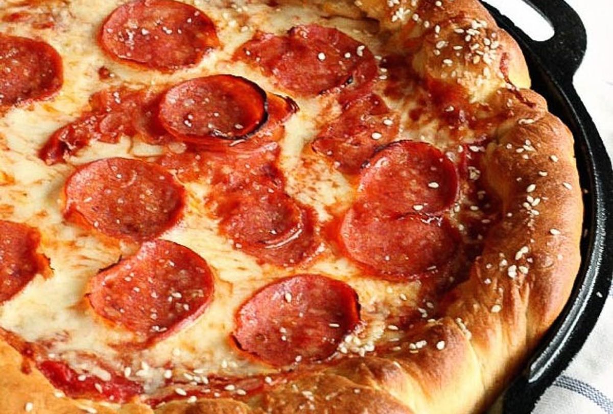 https://www.brit.co/media-library/deep-dish-pizza-recipes-cheat-day.jpg?id=21595438&width=1200&height=600&coordinates=0%2C161%2C0%2C162