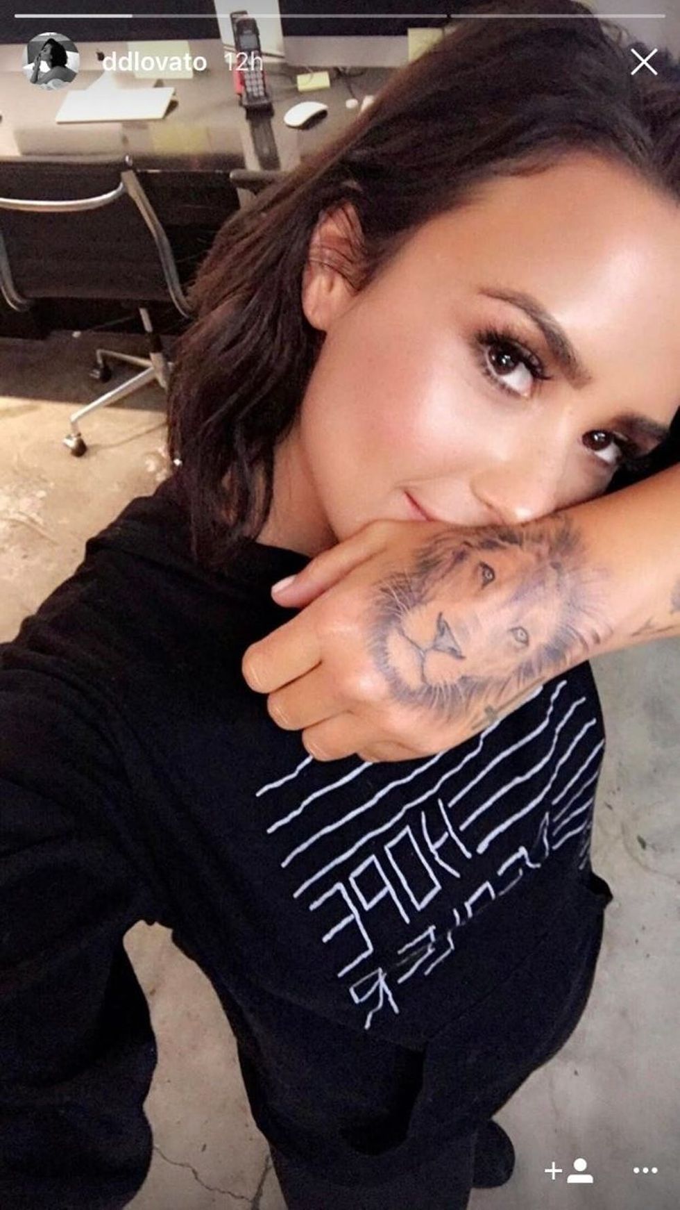 Demi Lovato lion hand tattoo