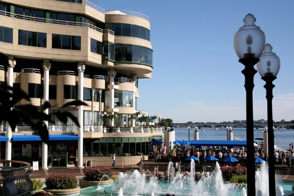 Diners gather on a patio in Washington Harbor