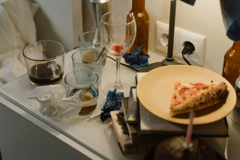 dirty dishes on nightstand