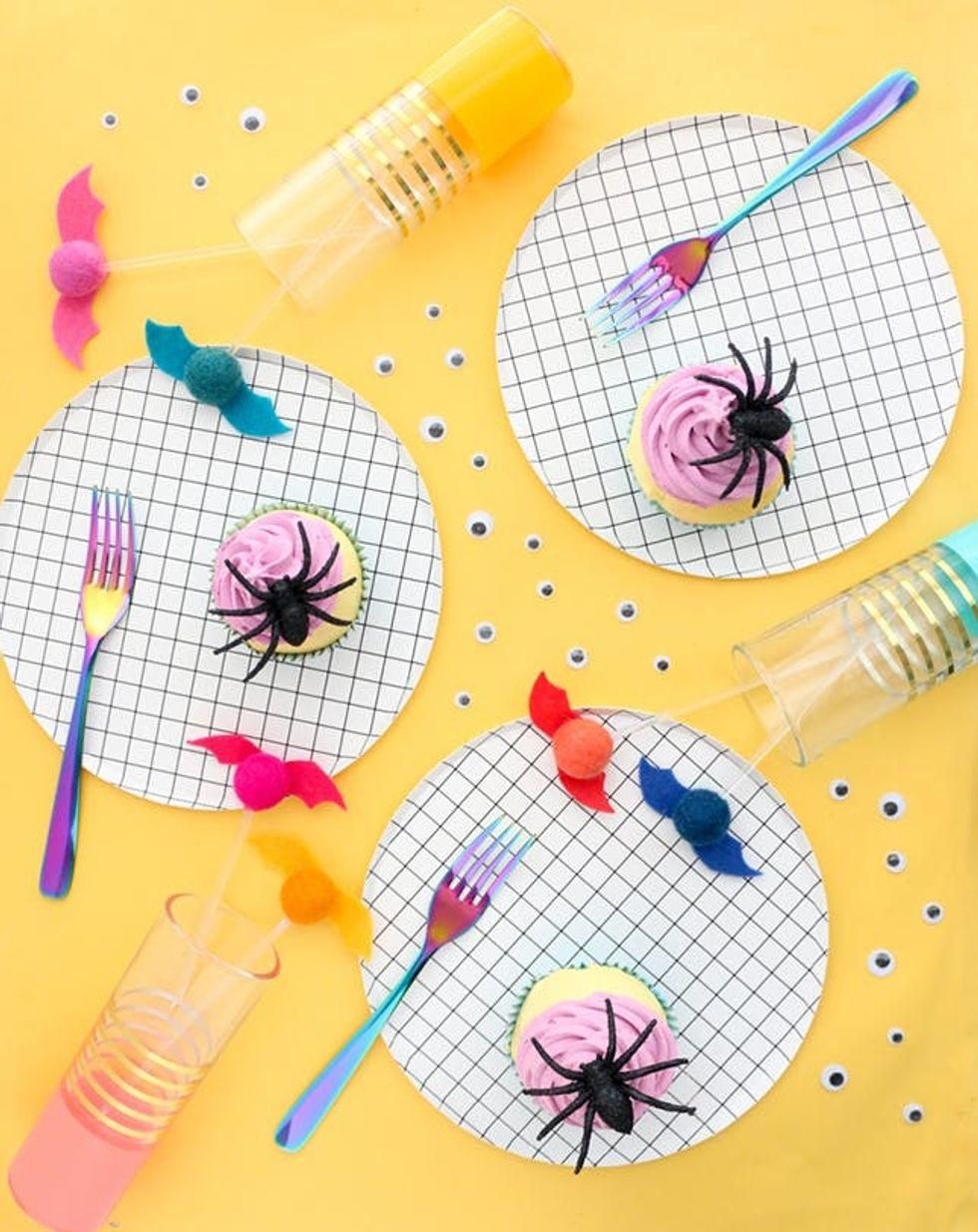 DIY Felted Bat Drink Stirrers on yellow background