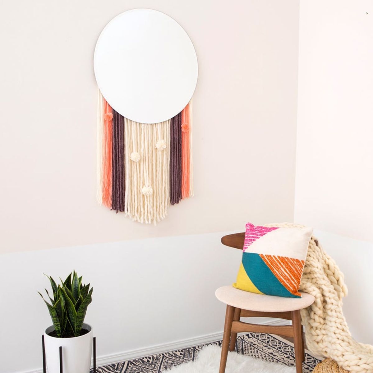 diy wall hanging mirror with pom poms