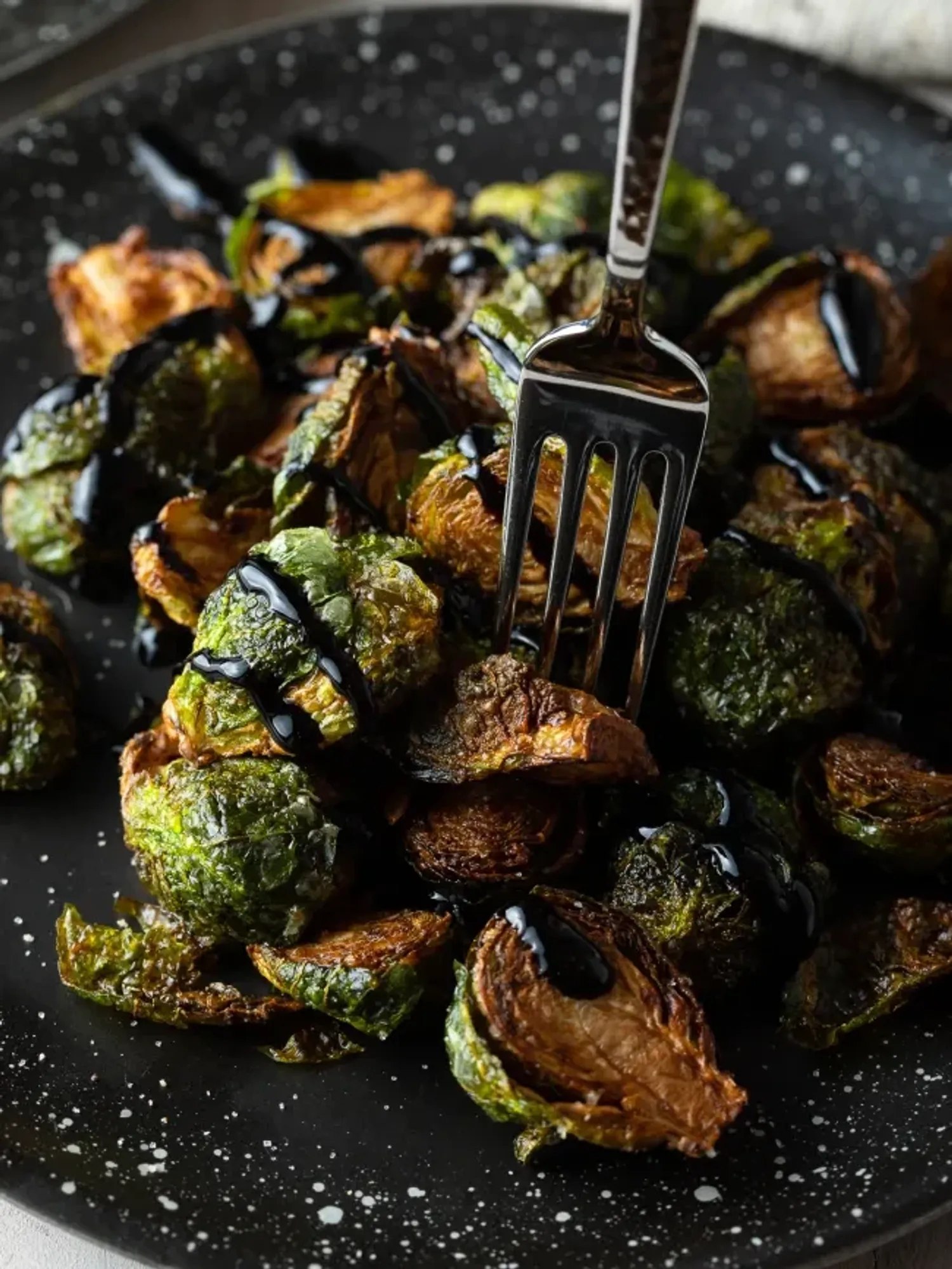 easy vegetable recipes crispy brussel sprouts drizzled with tangy garlic sauce