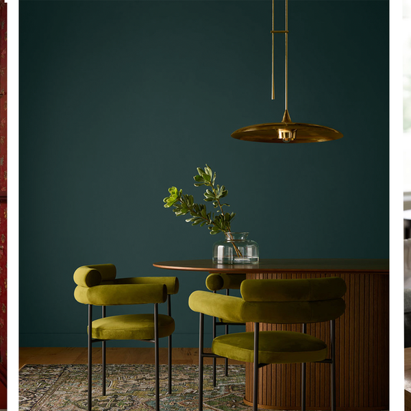 Eclectic interiors with vibrant colors, featuring art, plants, and a blue floral vase.