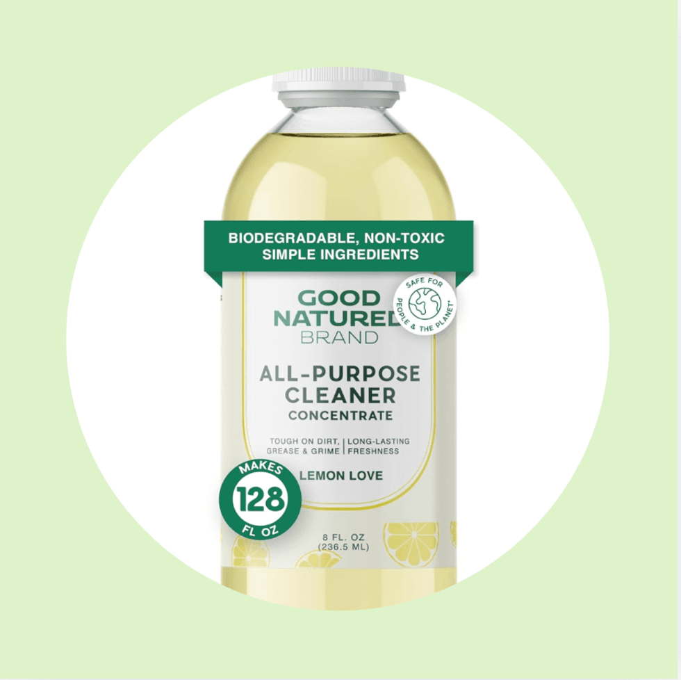 Eco-friendly cleaner concentrate bottle, "Good Natured Brand," lemon scent.