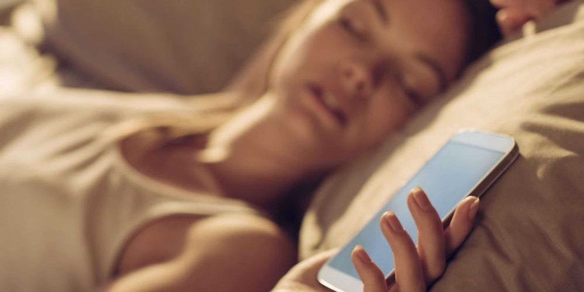 The Scary Reason You Shouldn’t Sleep With Your Phone Under the Pillow