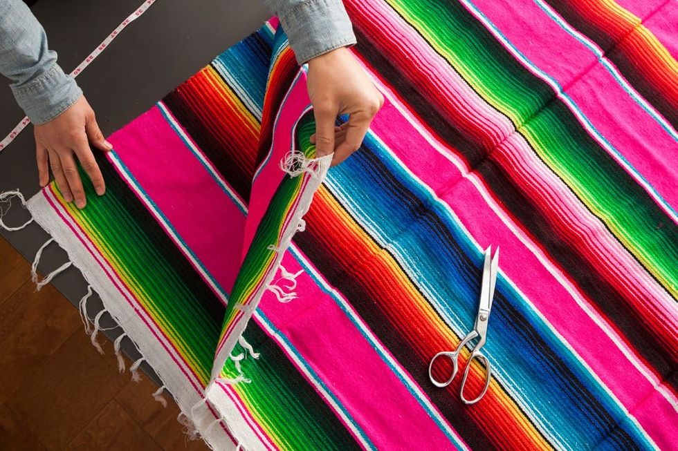 Turn a Colorful Blanket into a Chic NoSew Poncho Brit + Co