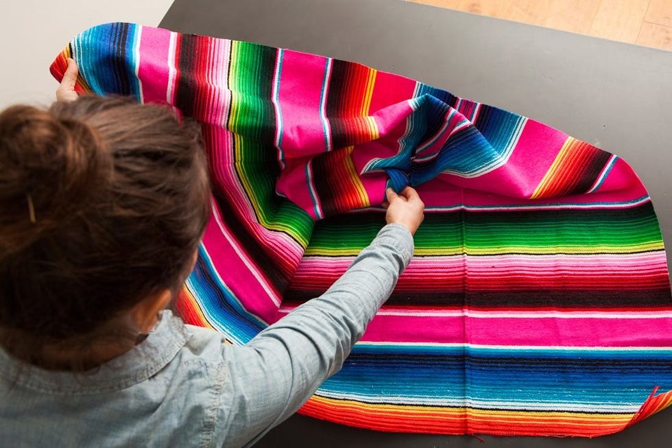Turn a Colorful Blanket into a Chic NoSew Poncho Brit + Co